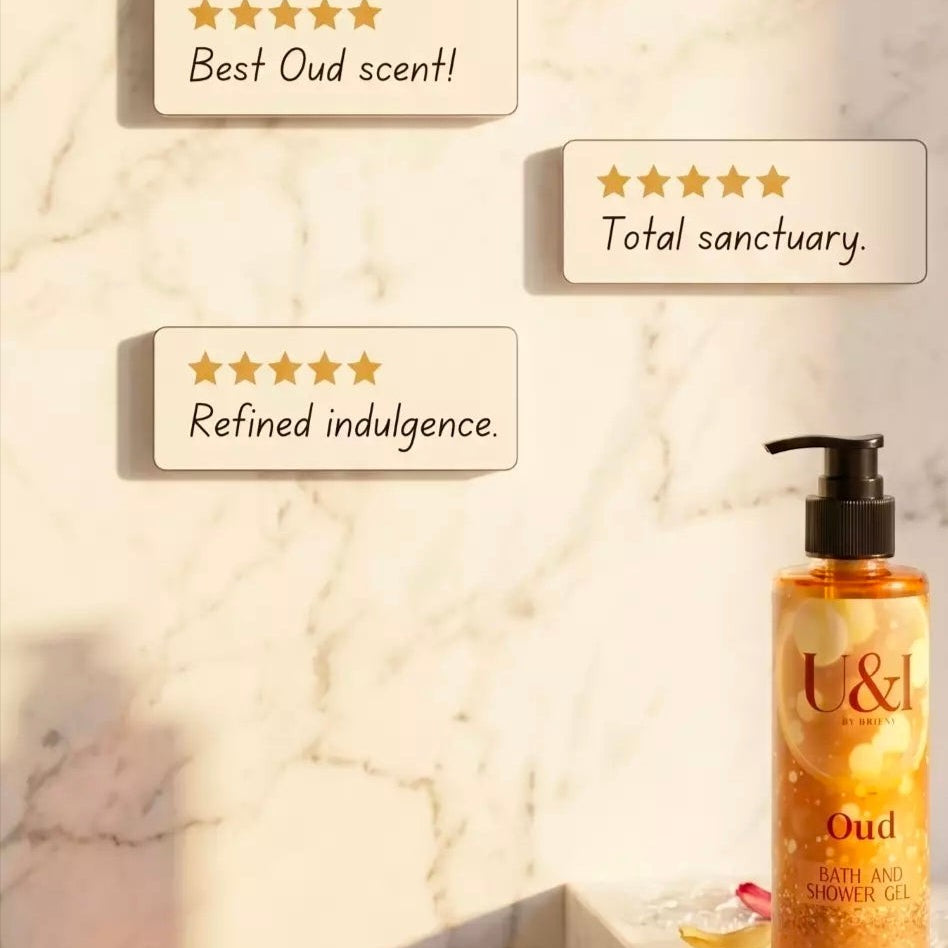 U&I Oud bath and shower gel bottle with five-star customer review cards on a marble background