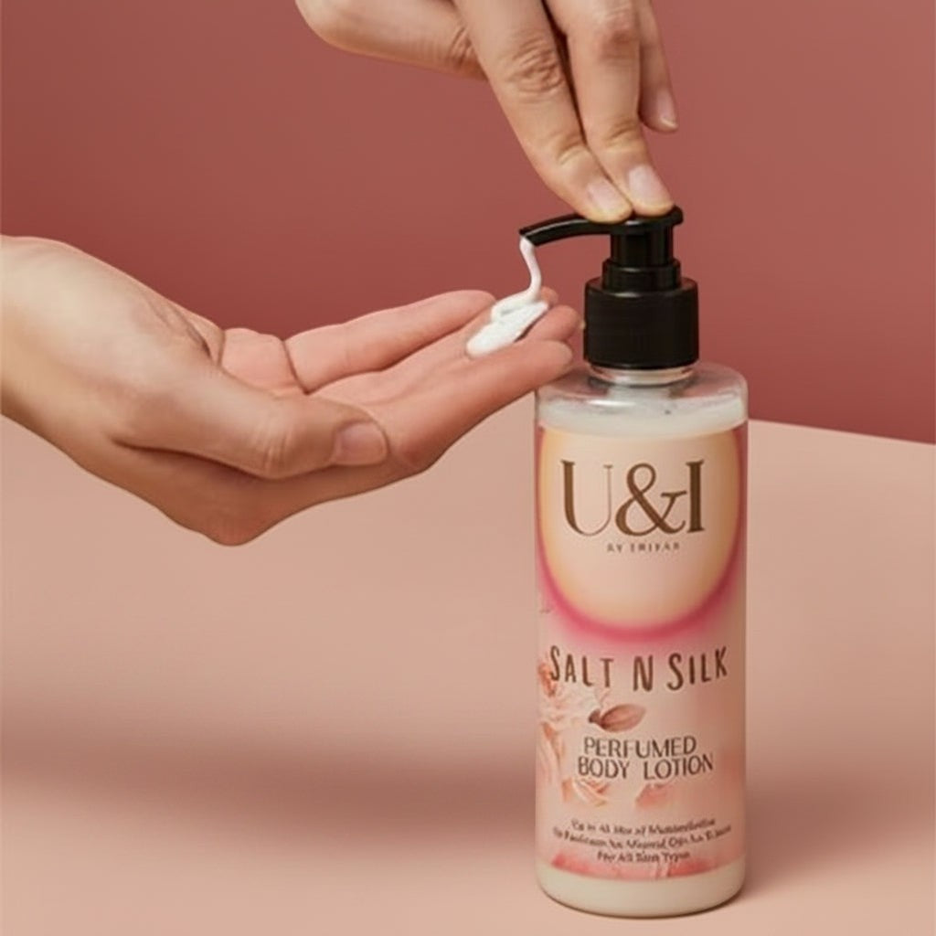 U&I Salt N Silk perfumed body lotion in a 200ml pump bottle being dispensed into a hand for moisturizing application.